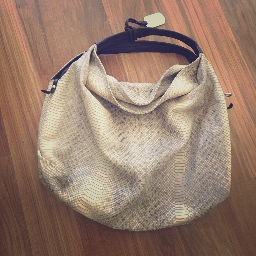 Gorgeous Furla snake skin print bag. Like new.